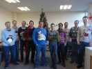 The Optima Team wearing Christmas jumpers
